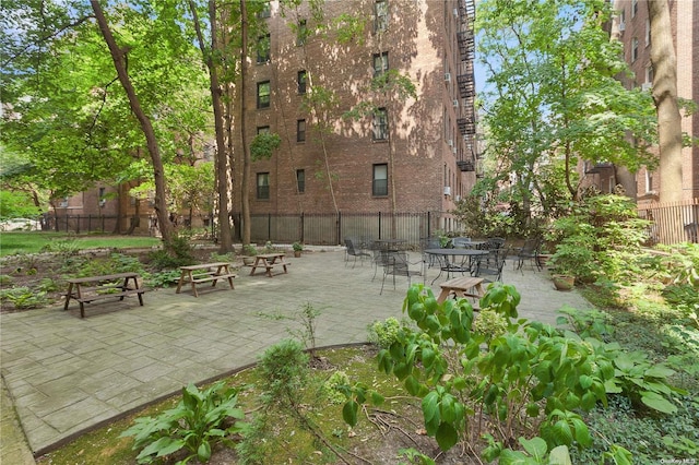 view of community with a patio