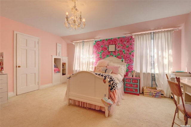 bedroom featuring a notable chandelier and light colored carpet