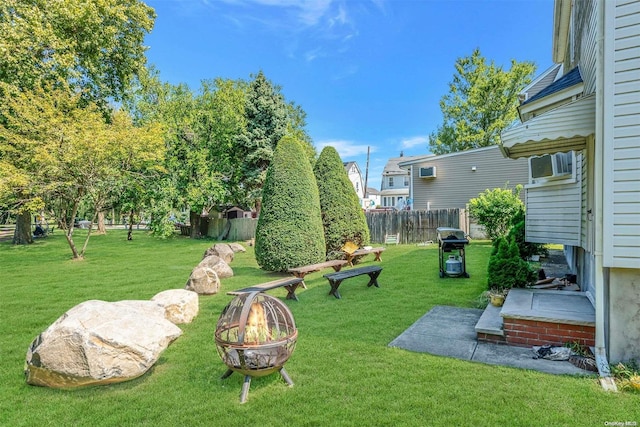 view of yard featuring a fire pit