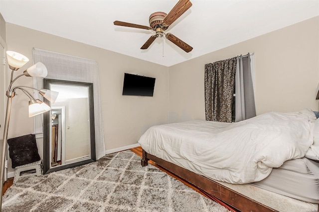 bedroom featuring ceiling fan and light hardwood / wood-style floors