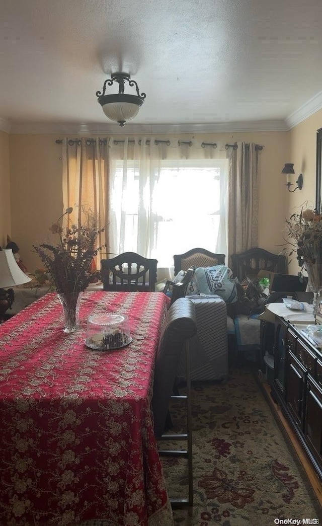 dining room featuring ornamental molding