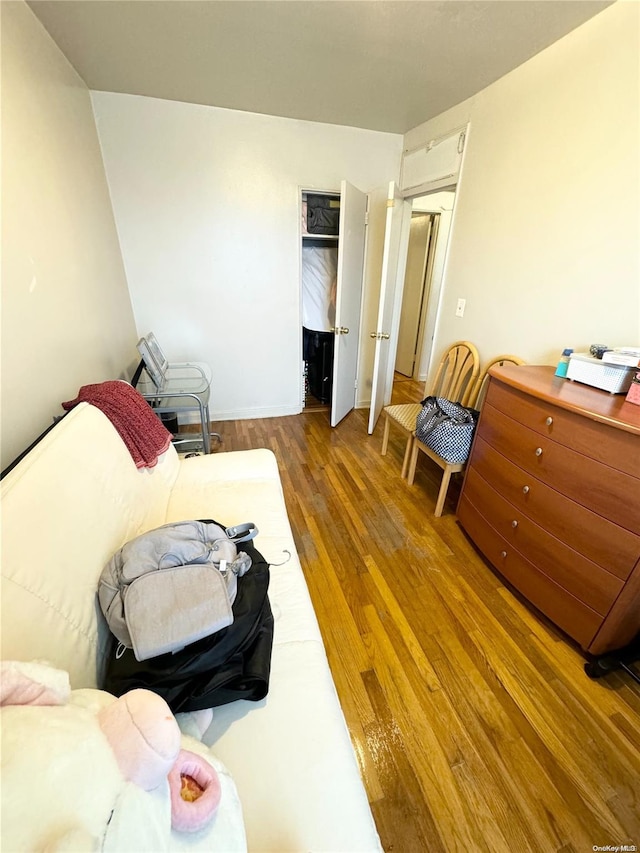 bedroom featuring hardwood / wood-style flooring