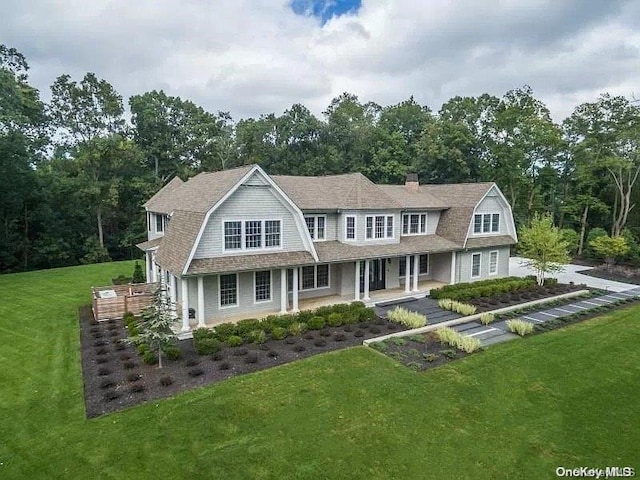 view of front of property with a front lawn