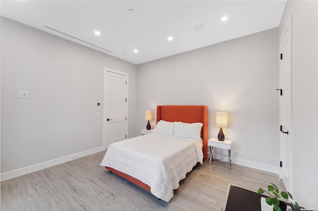 bedroom with light hardwood / wood-style flooring