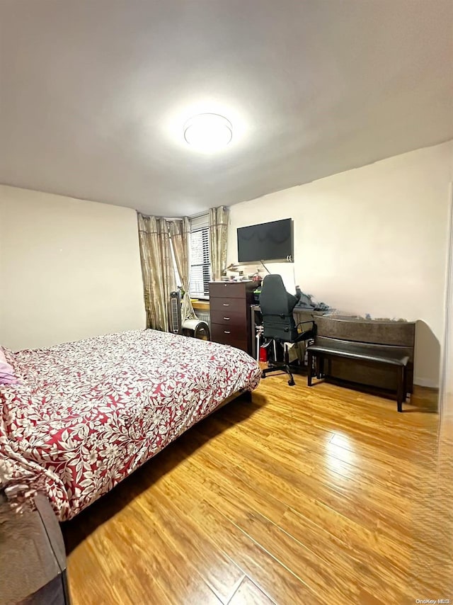 bedroom featuring light hardwood / wood-style flooring