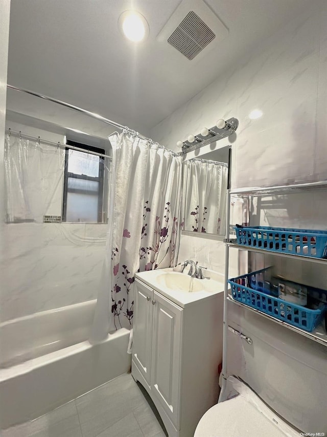 full bathroom with toilet, shower / tub combo, vanity, and tile patterned floors