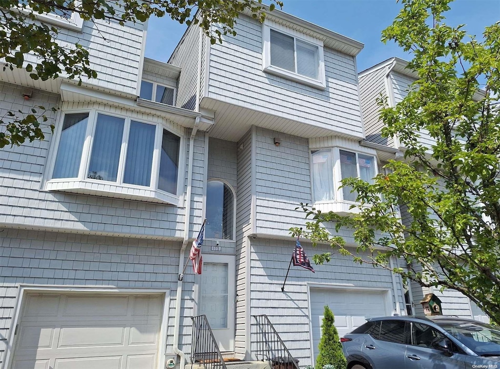 110F Dinsmore St Unit 110F, Staten Island, NY 10314 - view of home's exterior with a garage
