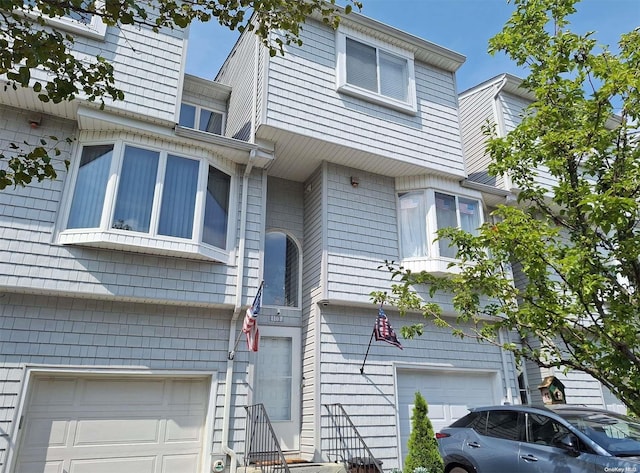 110F Dinsmore St Unit 110F, Staten Island, NY 10314 - view of home's exterior with a garage
