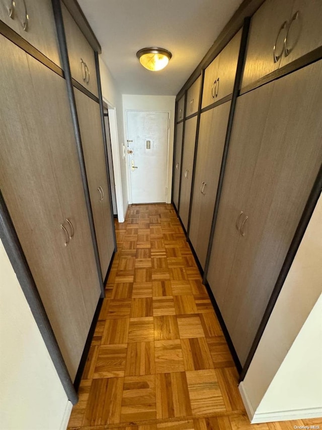 hall with light parquet floors