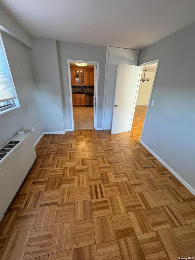 interior space with light parquet floors