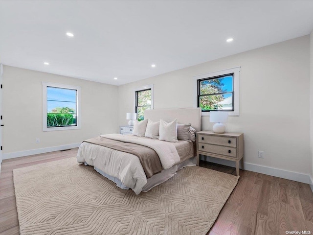 bedroom with light wood-type flooring