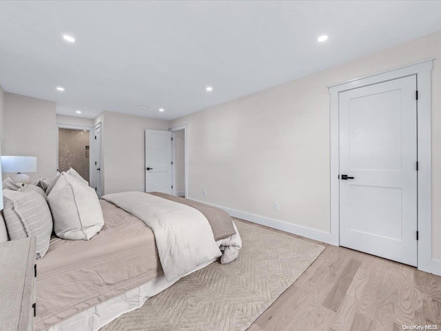 bedroom with light wood-type flooring