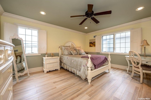 bedroom featuring ceiling fan, light hardwood / wood-style floors, and ornamental molding