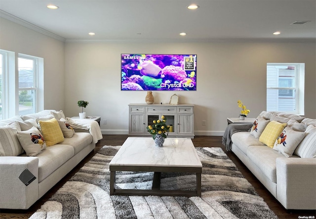 living room with ornamental molding and dark wood-type flooring