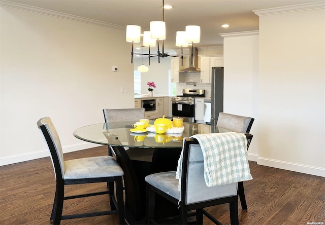 dining area featuring a chandelier, dark wood-type flooring, and ornamental molding