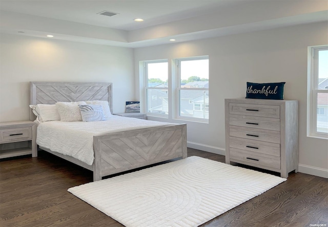 bedroom featuring dark hardwood / wood-style floors