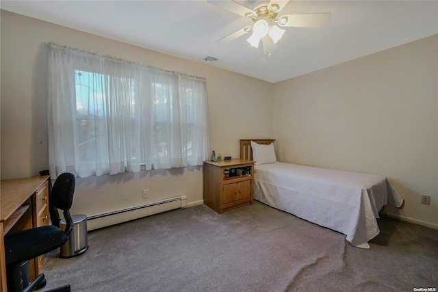 carpeted bedroom with ceiling fan and a baseboard radiator