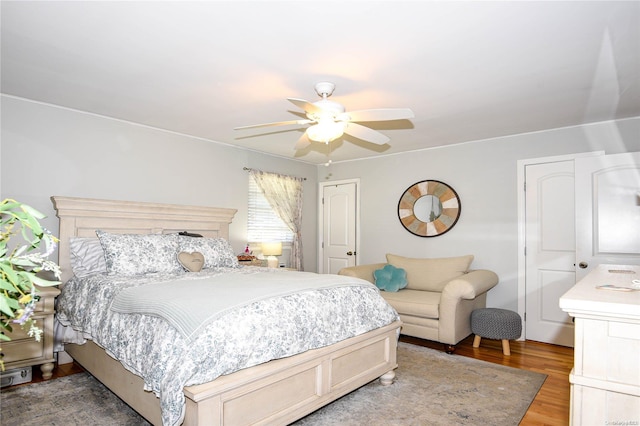 bedroom featuring ceiling fan and hardwood / wood-style floors