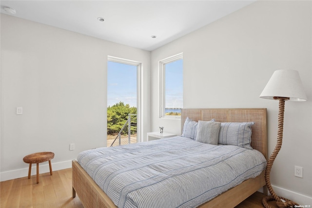 773 Dune Rd, Westhampton Beach, NY 11978 - bedroom with light wood-style flooring and recessed lighting
