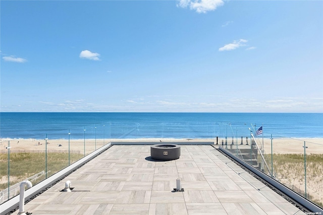 773 Dune Rd, Westhampton Beach, NY 11978 - water view with an outdoor fire pit and nearby beach