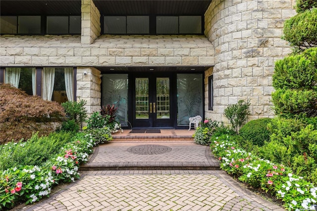 entrance to property featuring french doors