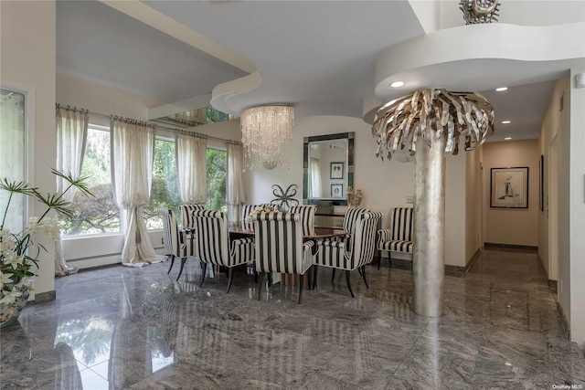 dining space with a chandelier and a baseboard radiator