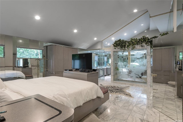 bedroom featuring lofted ceiling