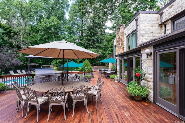 wooden terrace with area for grilling