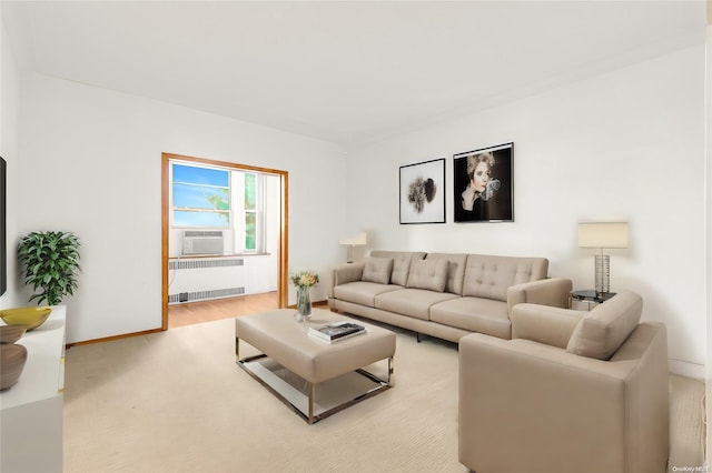 living room with hardwood / wood-style flooring, radiator, and cooling unit