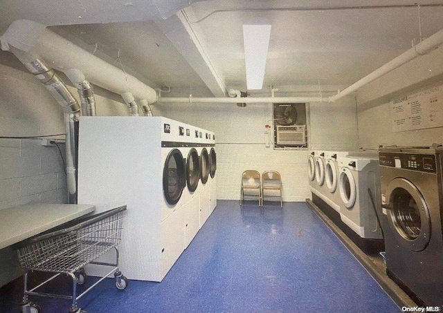 laundry room with washer and clothes dryer