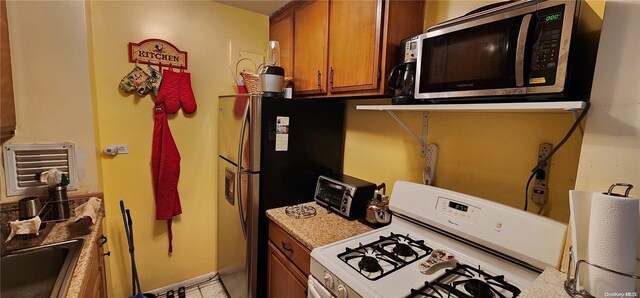 kitchen with sink and stainless steel appliances