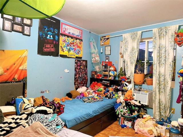 bedroom with parquet floors and cooling unit