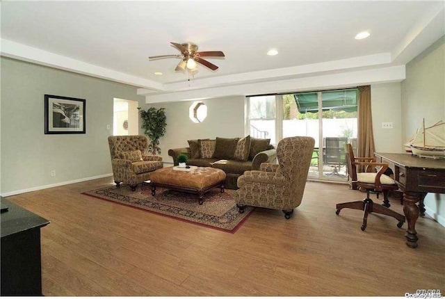 215 Roosevelt Blvd, Long Beach, NY 11561 - living room with a tray ceiling, wood finished floors, ceiling fan, plenty of natural light, and recessed lighting