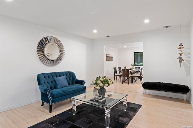 living room with hardwood / wood-style flooring