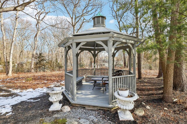 wooden deck featuring a gazebo