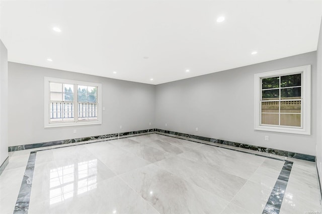 22 Solar Ln, Searingtown, NY 11507 - unfurnished room featuring healthy amount of natural light, recessed lighting, inlaid floor details, and baseboards