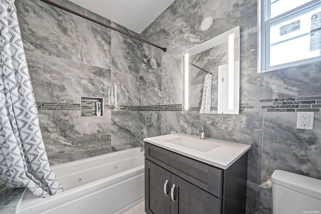 full bathroom with shower / bath combination with curtain, vanity, toilet, and tile walls