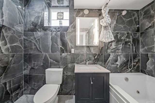 bathroom with vanity, tile walls, and toilet