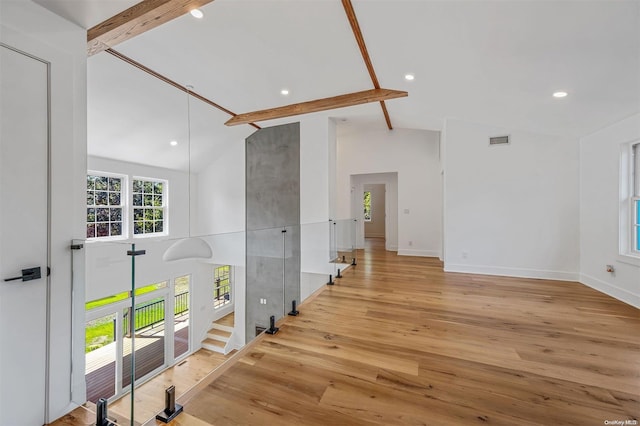 2060 Shipyard Ln, East Marion, NY 11939 - hall with light wood finished floors, beamed ceiling, baseboards, high vaulted ceiling, and recessed lighting
