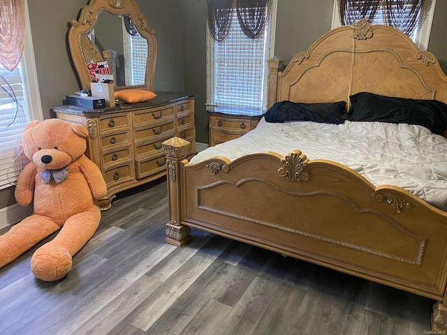 bedroom featuring dark hardwood / wood-style floors