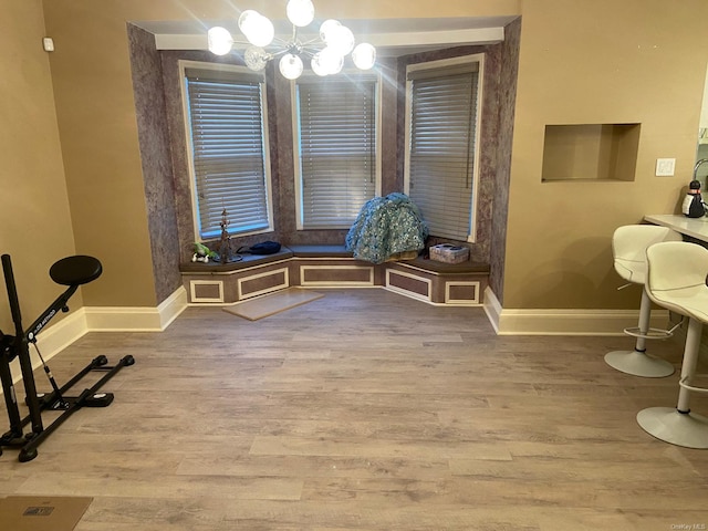 dining room with wood-type flooring