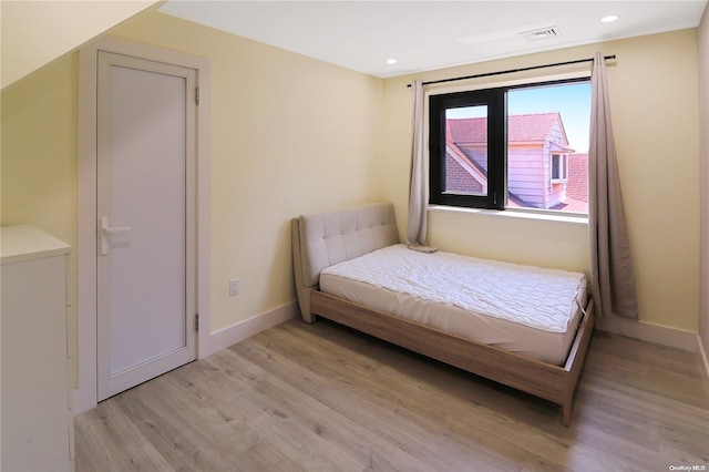 bedroom featuring light hardwood / wood-style flooring