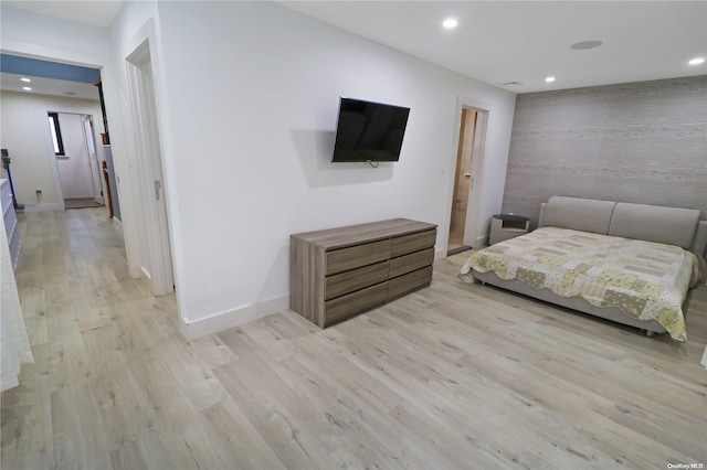 unfurnished bedroom featuring light wood-type flooring