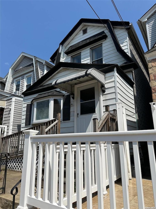 view of front of house with a deck