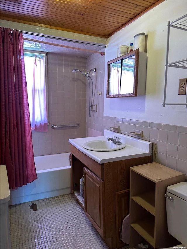 full bathroom featuring tile patterned floors, wood ceiling, shower / bath combo with shower curtain, tile walls, and toilet