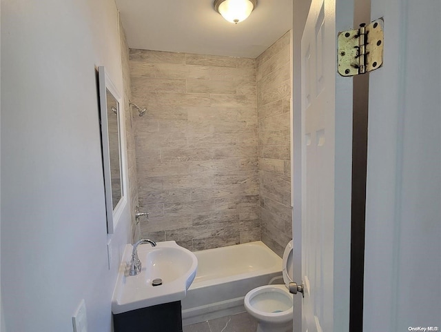 full bathroom with tile patterned floors, tiled shower / bath combo, toilet, and vanity