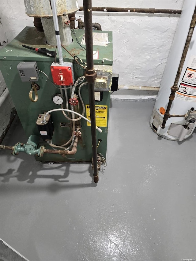 utility room featuring water heater