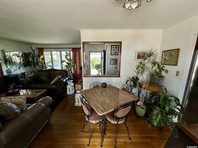 dining room featuring dark hardwood / wood-style flooring