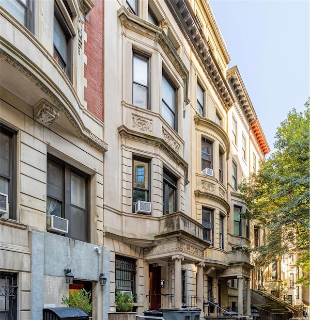 view of building exterior with cooling unit