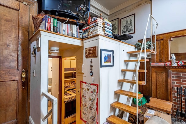 stairs featuring ornamental molding